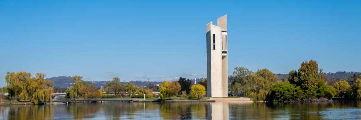 An image of the National Carillon reflected in the waters of Lake Burley Griffin