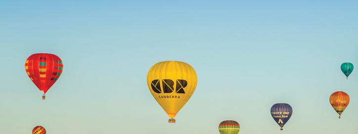 Balloons over Lake Burley Griffin during Enlighten Festival.