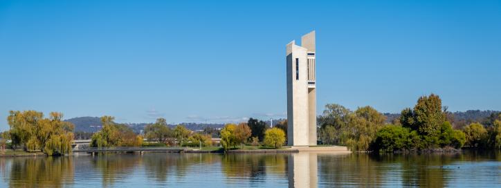An image of the National Carillon reflected in the waters of Lake Burley Griffin