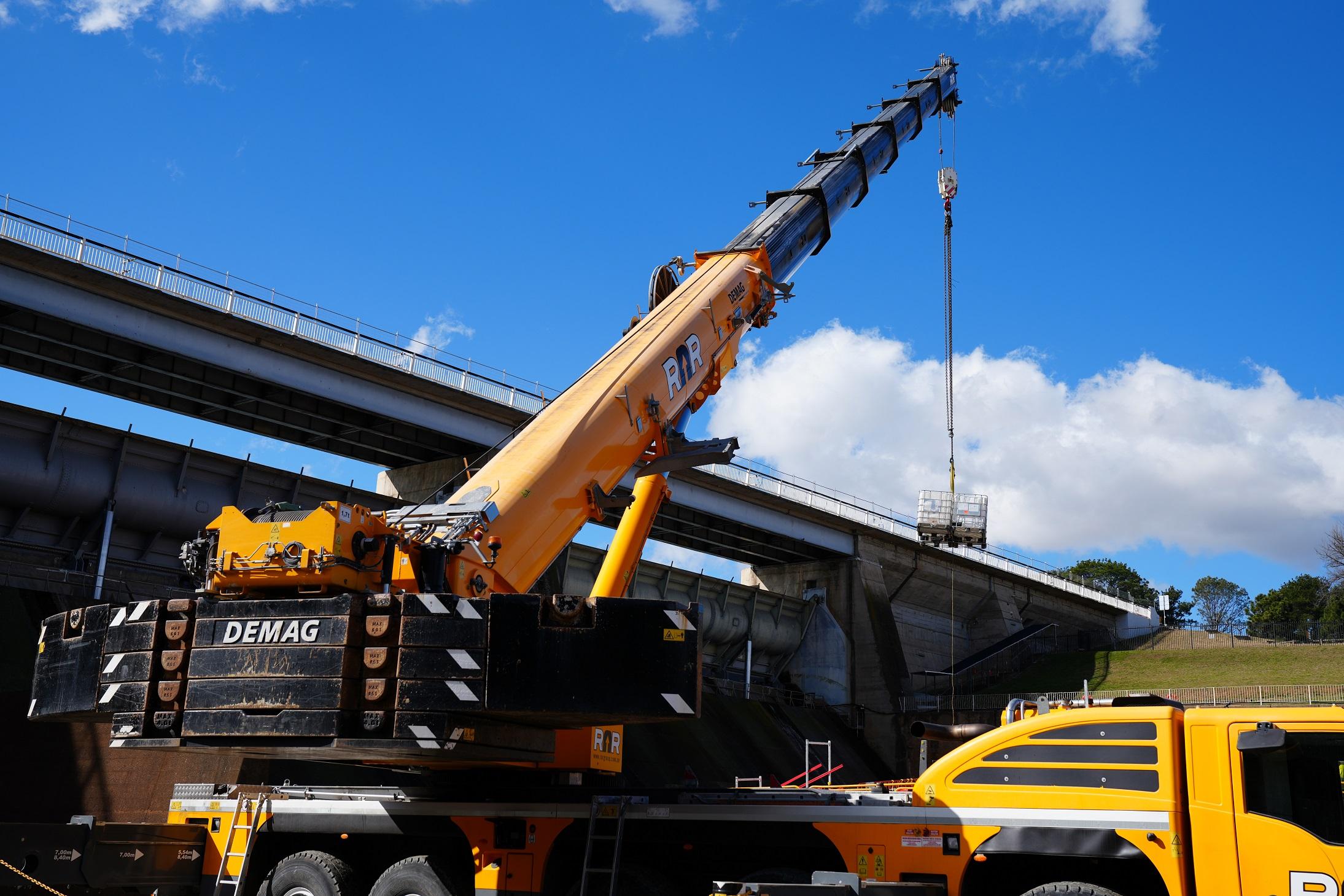 This image shows the 250 tonne crane in action on site.