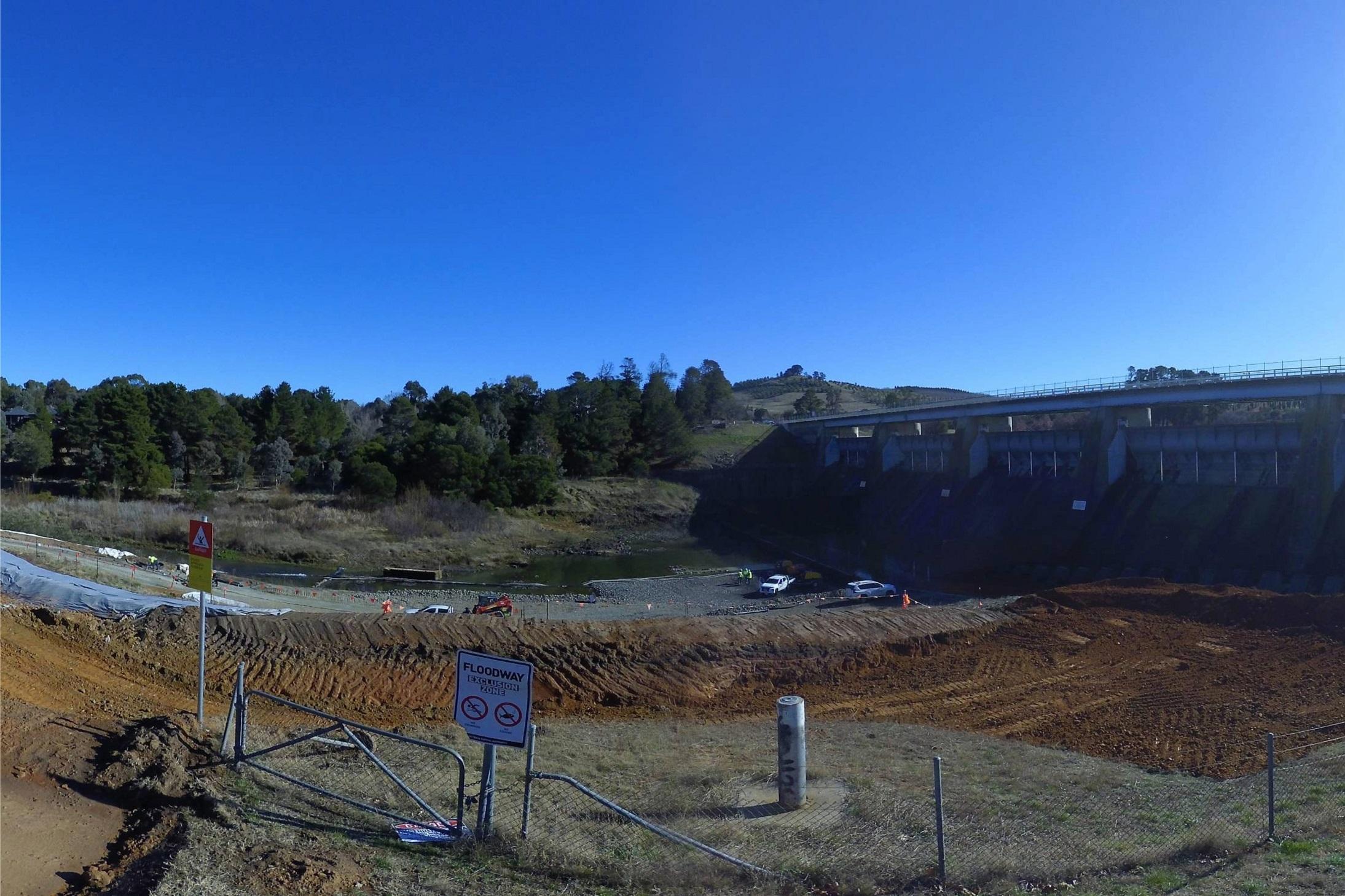 This is image is from a timelapse camera showing the dam empty and the access roads to the dam being construction.