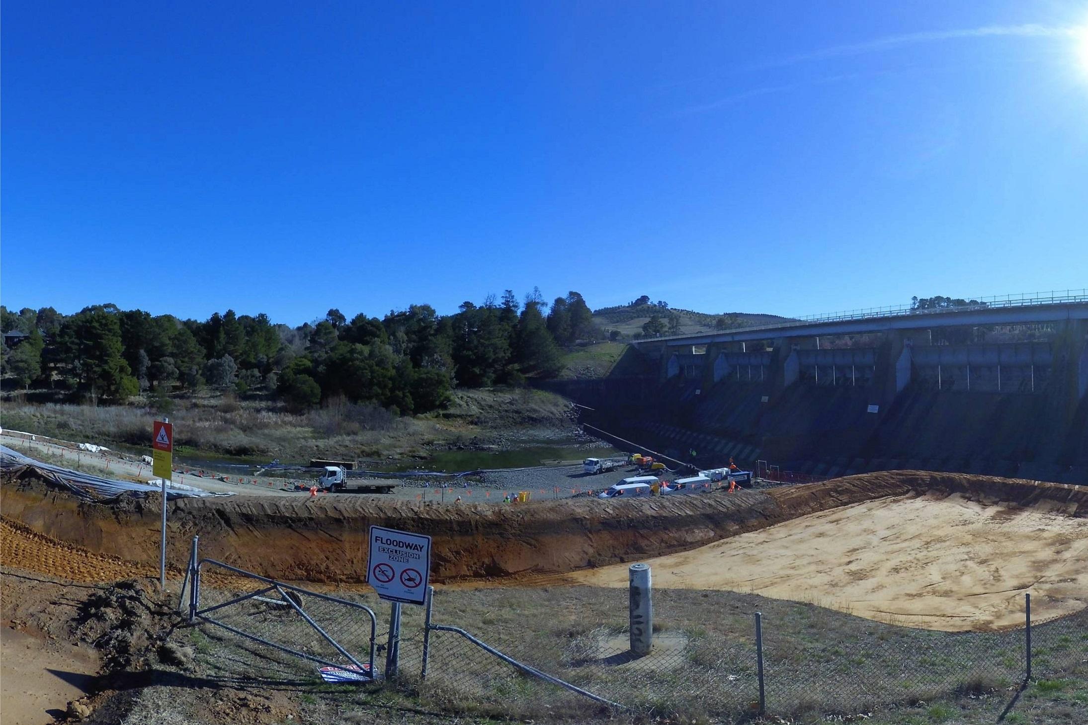 This is image is from a timelapse camera showing the dam empty and the access roads to the dam being construction.