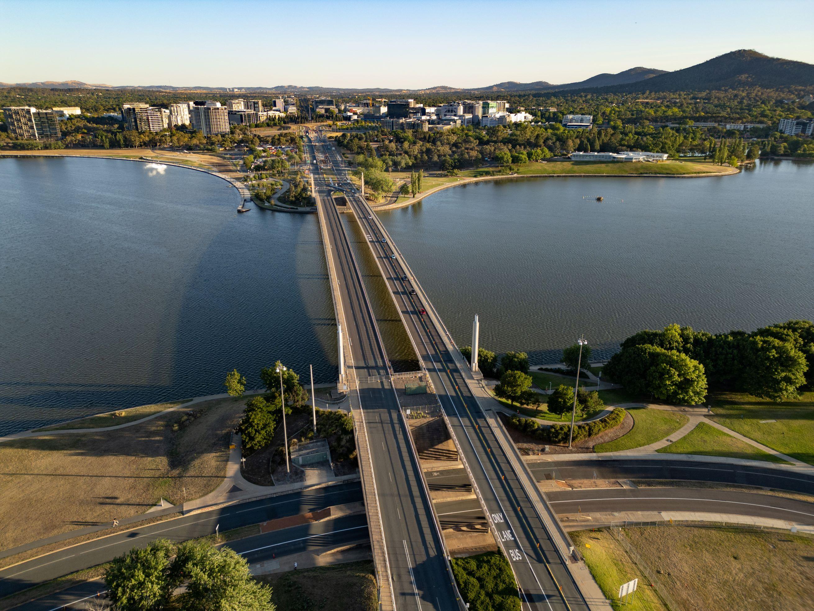 This image is a drone photo of Commonwealth Avenue Bridge taken from the southern end looking towards the City.