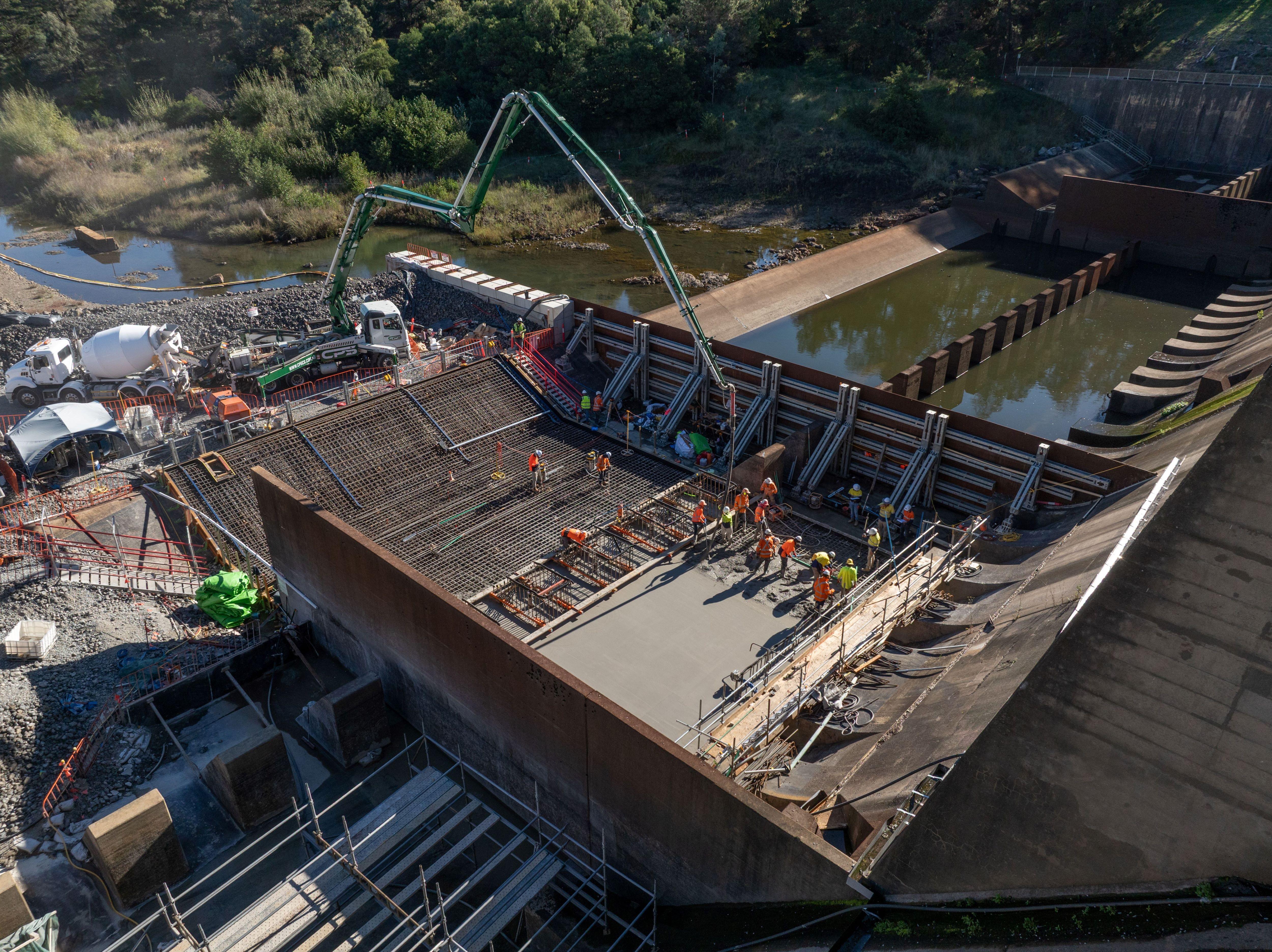 Drone image of Scrivener Dam during the concrete pour from above