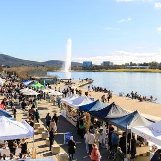Market stalls by the lake