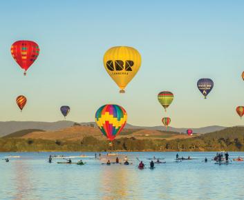 Balloons over Lake Burley Griffin during Enlighten Festival.