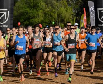 Group of runners starting off at a previous Canberra Times Fun Run