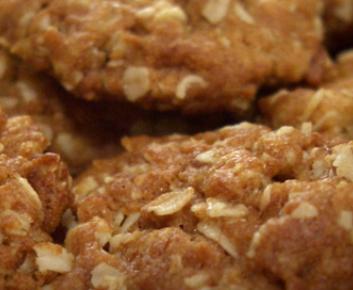 A plate of freshly baked, golden ANZAC Biscuits