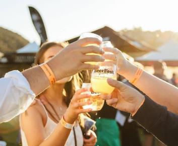 People Cheers-ing their beers